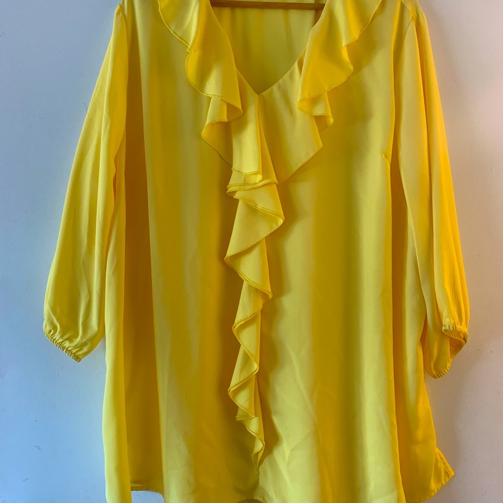 Beautiful bright yellow blouse with 3/4 in sleeves.